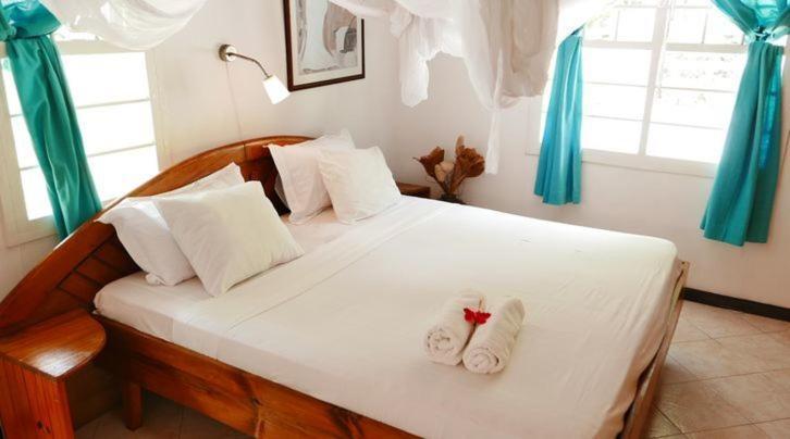 Kokogrove Chalets Anse Royale Chambre photo