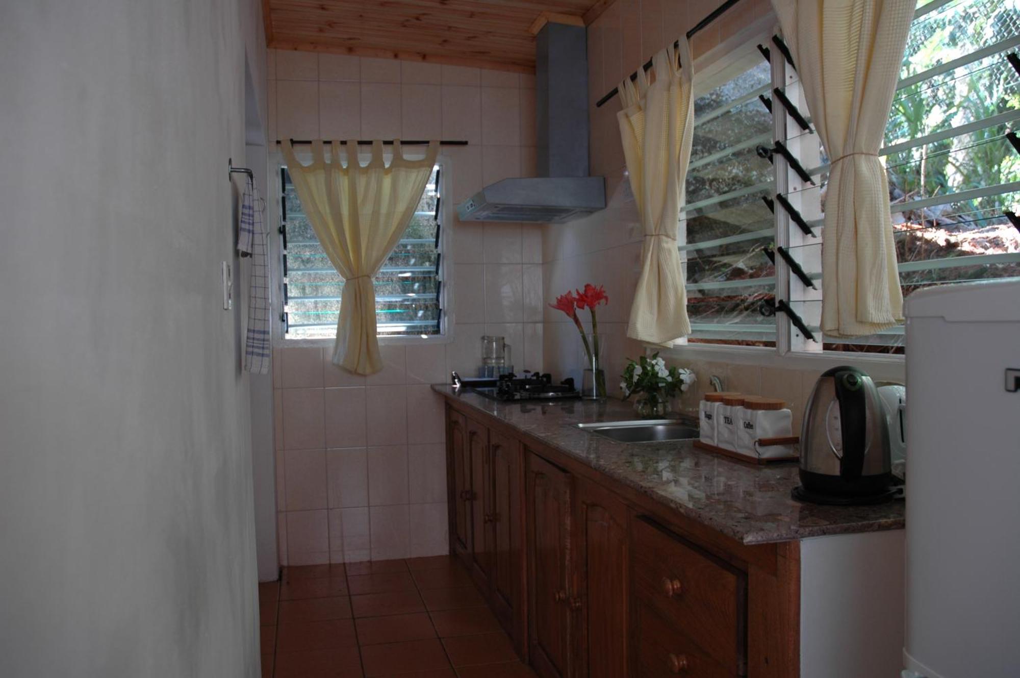 Kokogrove Chalets Anse Royale Chambre photo