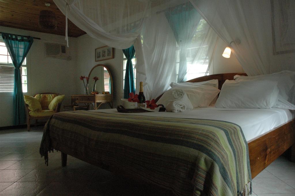 Kokogrove Chalets Anse Royale Chambre photo