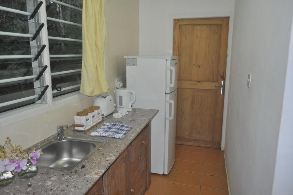 Kokogrove Chalets Anse Royale Chambre photo